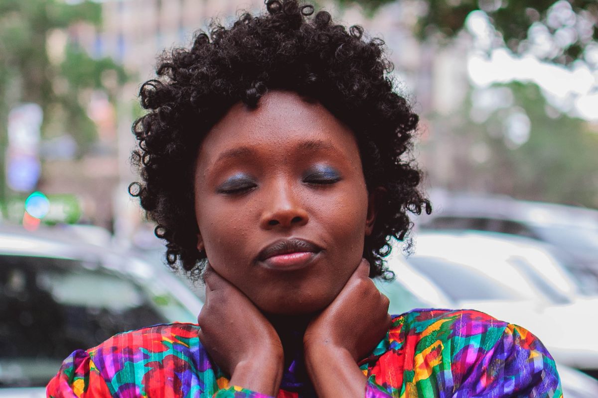 Woman with chronic neck pain seeking non-surgical stem cell treatment at Stem Cell Carolina Charlotte NC