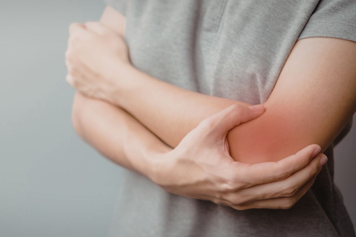 Patient with elbow pain considering stem cell therapy in Charlotte NC