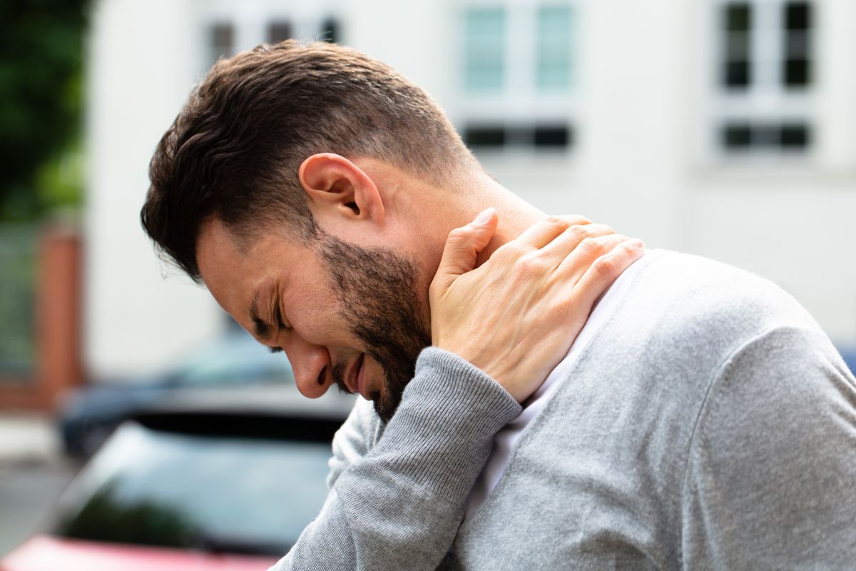 Man with chronic neck pain seeking stem cell therapy in Charlotte NC