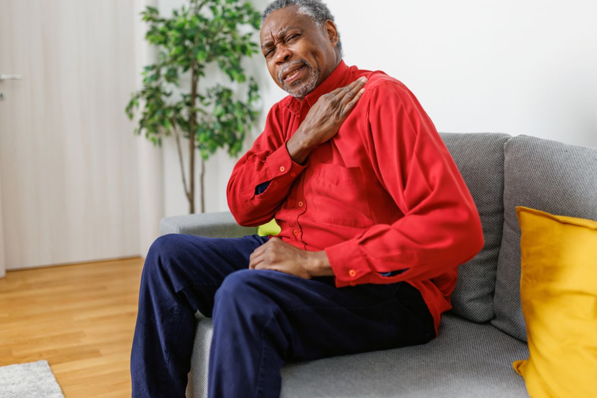 Man with chronic shoulder pain seeking non-surgical stem cell treatment at Stem Cell Carolina Charlotte NC