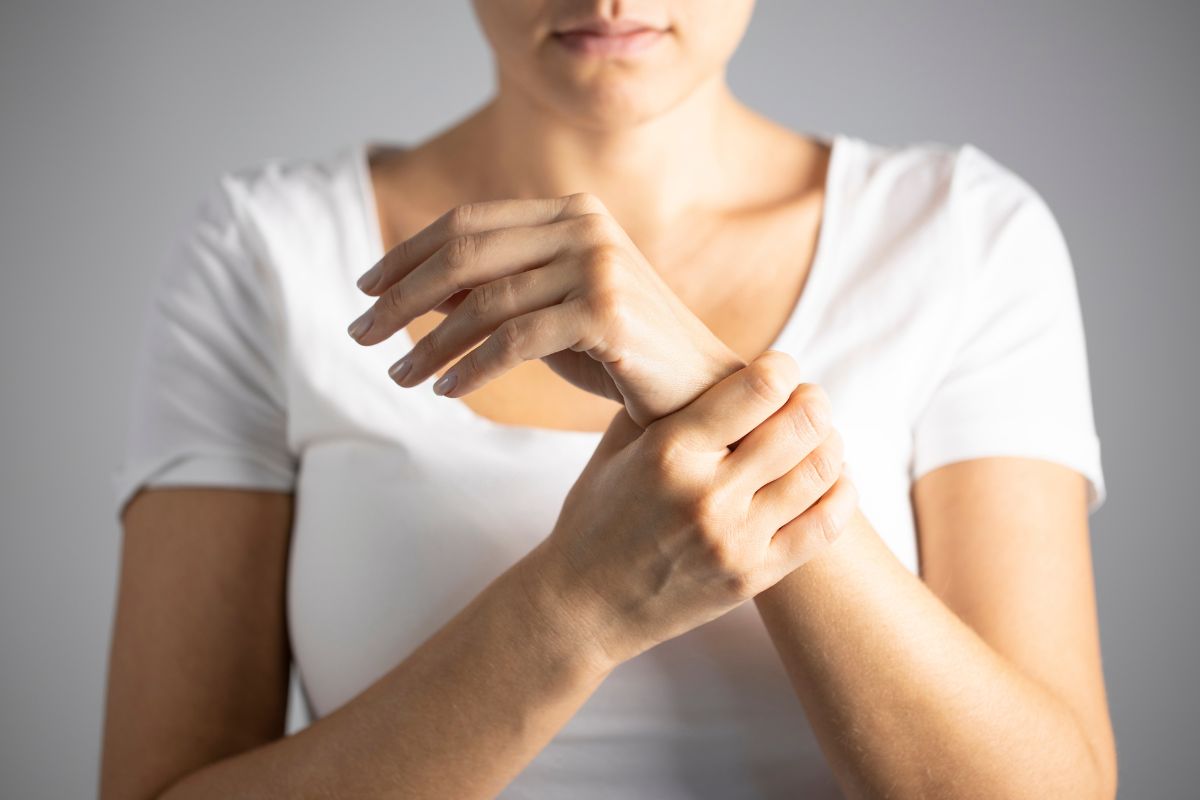 Woman with chronic wrist pain considering stem cell therapy in Charlotte NC